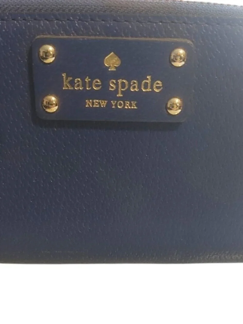 kate spade Blue Pebbled Leather Zip Wallet -callout on spine